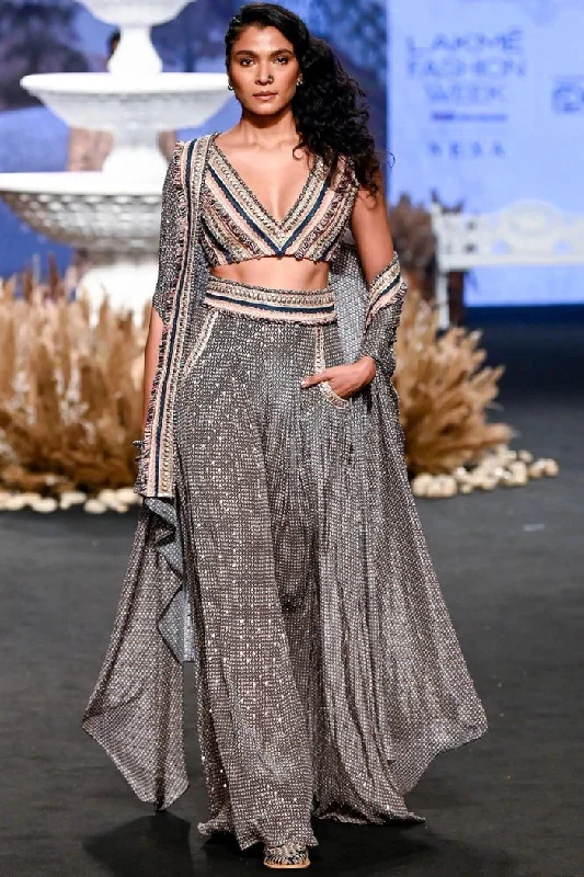 TEXTURED CROP TOP TEAMED WITH EMBELLISHED PINK BUTTI PRINT BOX PLEAT PANTS WITH HIGHLIGHTED CAPE Beaded Sequined Faux Fur TEXTURED CROP TOP TEAMED WITH EMBELLISHED PINK BUTTI PRINT BOX PLEAT PANTS WITH HIGHLIGHTED CAPE Beaded Sequined Faux Fur